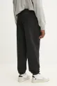 Одяг Бавовняні спортивні штани Tommy Jeans DM0DM20931 чорний