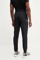 Odzież Under Armour spodnie treningowe Woven Utility 1389256 czarny