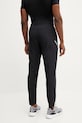 Odzież Under Armour spodnie treningowe Woven Utility 1389256 czarny