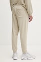 Converse spodnie dresowe 10026982.A09 beżowy