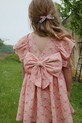 Konges Sløjd sukienka dziecięca AVA BOW DRESS GOTS wzorzyste różowy KS102444