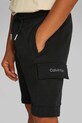 Дитячі бавовняні шорти Calvin Klein Jeans IB0IB02440.PPYA чорний