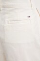Къс панталон Tommy Jeans бежов DW0DW21643