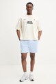 Bavlněné šortky Tommy Jeans DM0DM21369 modrá SS25