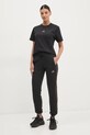 Памучна тениска adidas Essentials Animal JM5868 черен SS25