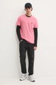 Бавовняна футболка Tommy Jeans DM0DM20322 рожевий SS25