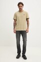 Хлопковая футболка Tommy Jeans DM0DM20802 зелёный SS25