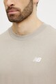 Памучна тениска New Balance MT41509ADS бежов