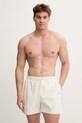 Tommy Hilfiger Koupací šortky pánské béžová UM0UM03748