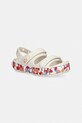 Crocs sandały dziecięce CROCBAND CRUISER GLOW CONFETTI BAND SANDAL T beżowy 212528.CROCS.CROCBAND.C