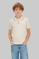 Calvin Klein Jeans polo dziecięce aplikacja beżowy IB0IB02370.128.176.PPY2