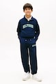 Chłopiec Tommy Hilfiger spodnie dresowe dziecięce bawełniane KB0KB10254.104.122.PPY2 granatowy