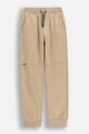 Coccodrillo spodnie dresowe dziecięce z bawełną WC6120101NBJ beżowy SS26