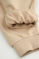 Coccodrillo spodnie dresowe dziecięce z bawełną WC6120101NBJ beżowy