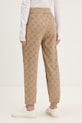 Ruházat HUGO nadrág otthoni viseletre TERRYMONOGRAM_PANTS 50556809 bézs