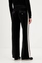 Odzież Juicy Couture spodnie dresowe welurowe JCGBJ126002 czarny