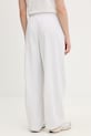 Odzież Puma spodnie dresowe bawełniane Wardrobe Essentials 634583 biały
