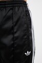 adidas Originals teplákové nohavice dámske Firebird čierna LD1806