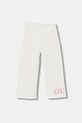 Guess spodnie dresowe bawełniane dziecięce nadruk beżowy K6RB01.KA6R4.PPY2