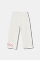 Guess spodnie dresowe bawełniane dziecięce K6RB01.KA6R4.PPY2 beżowy SS26