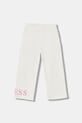 Guess spodnie dresowe bawełniane dziecięce K6RB01.KA6R4.PPY2 beżowy SS26