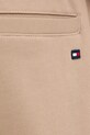 Odzież Tommy Hilfiger spodnie dresowe bawełniane MW0MW42537 beżowy