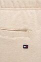 Tommy Hilfiger spodnie dresowe bawełniane beżowy MW0MW42537