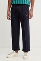Puma spodnie dresowe Class relax aplikacja granatowy 692072