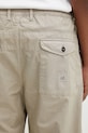 C.P. Company spodnie bawełniane beżowy 20CMPA158A110325G