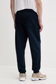 Îmbrăcăminte Tommy Jeans pantaloni de trening bărbați cu bumbac DM0DM23014 bleumarin