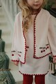 Konges Sløjd kardigan wełniany dziecięcy COLLETTE CARDIGAN wełna beżowy KS104270.PreSpring