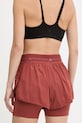 Odzież adidas by Stella McCartney szorty treningowe JY8147 pomarańczowy