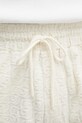 Bavlněné šortky Drôle de Monsieur Monogramme béžová J.BS158.CO201.OW