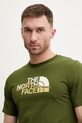 The North Face t-shirt bawełniany MOUNTAIN zielony NF0A8GUXBRI1