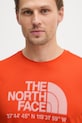 The North Face tričko pánske LOGO GRAPHIC oranžová NF0A8BEJG6L1