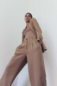 Kalhoty MUUV. spodnie.garniturow.REAU béžová ZS24
