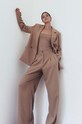 Oblečení Kalhoty MUUV. spodnie.garniturow.REAU béžová