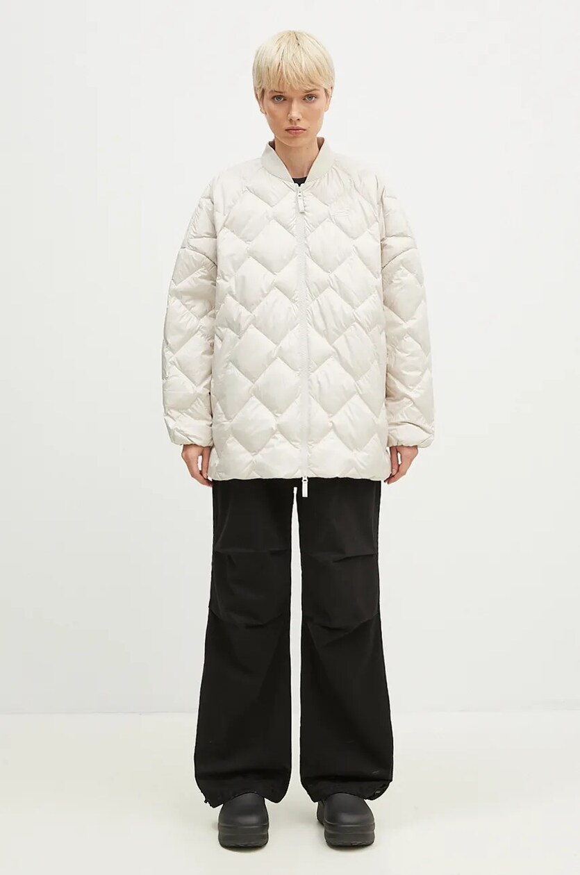 New Balance down jacket Pinnacle Bomber women's beige color New Balance down jacket Pinnacle Bomber women's beige color
