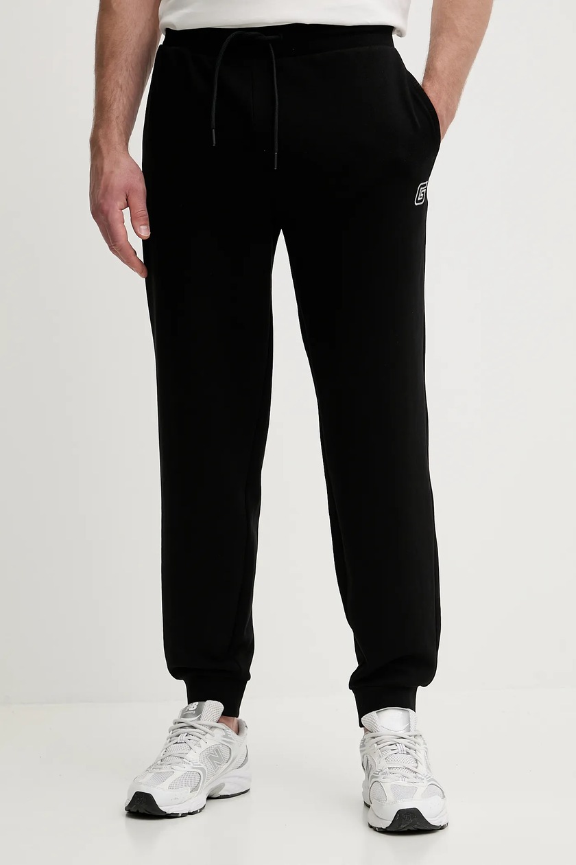 Guess spodnie dresowe ALDWIN męskie kolor czarny gładkie