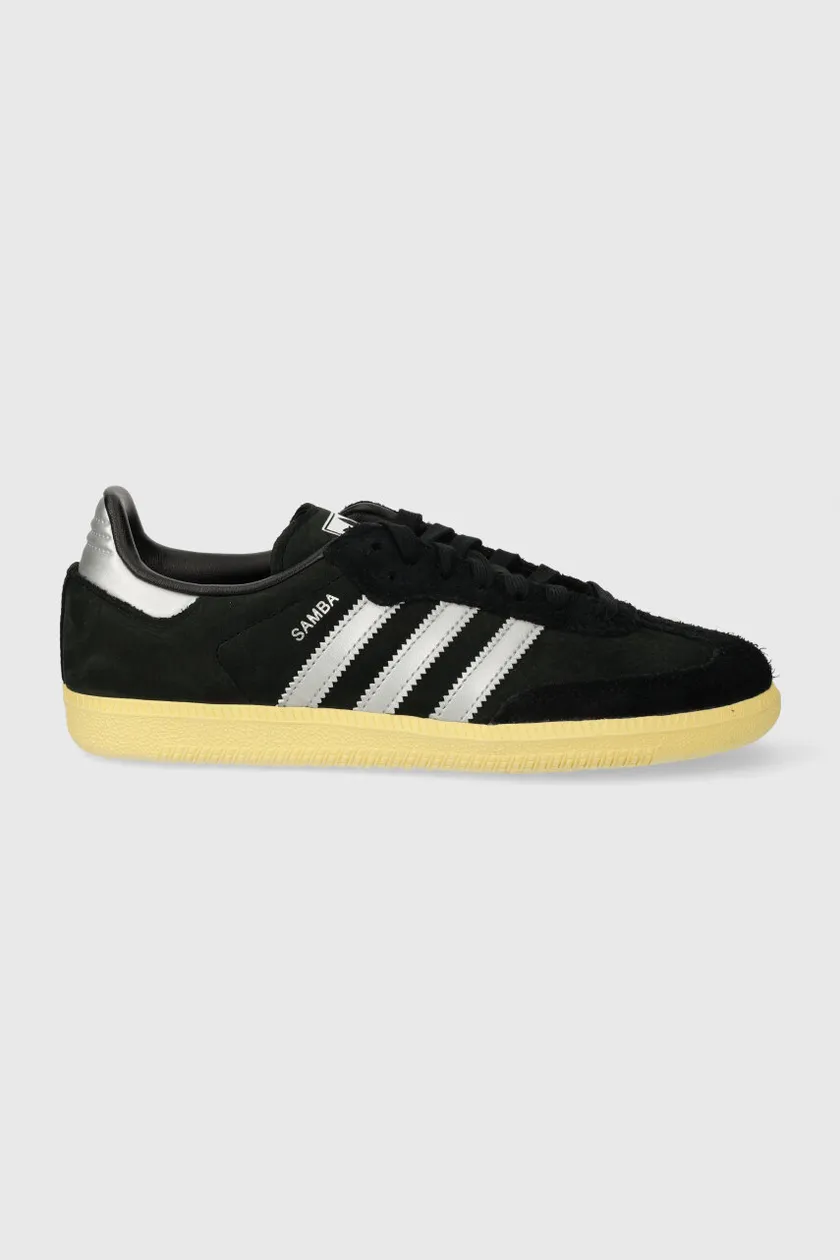 Black adidas best sale with gold sole