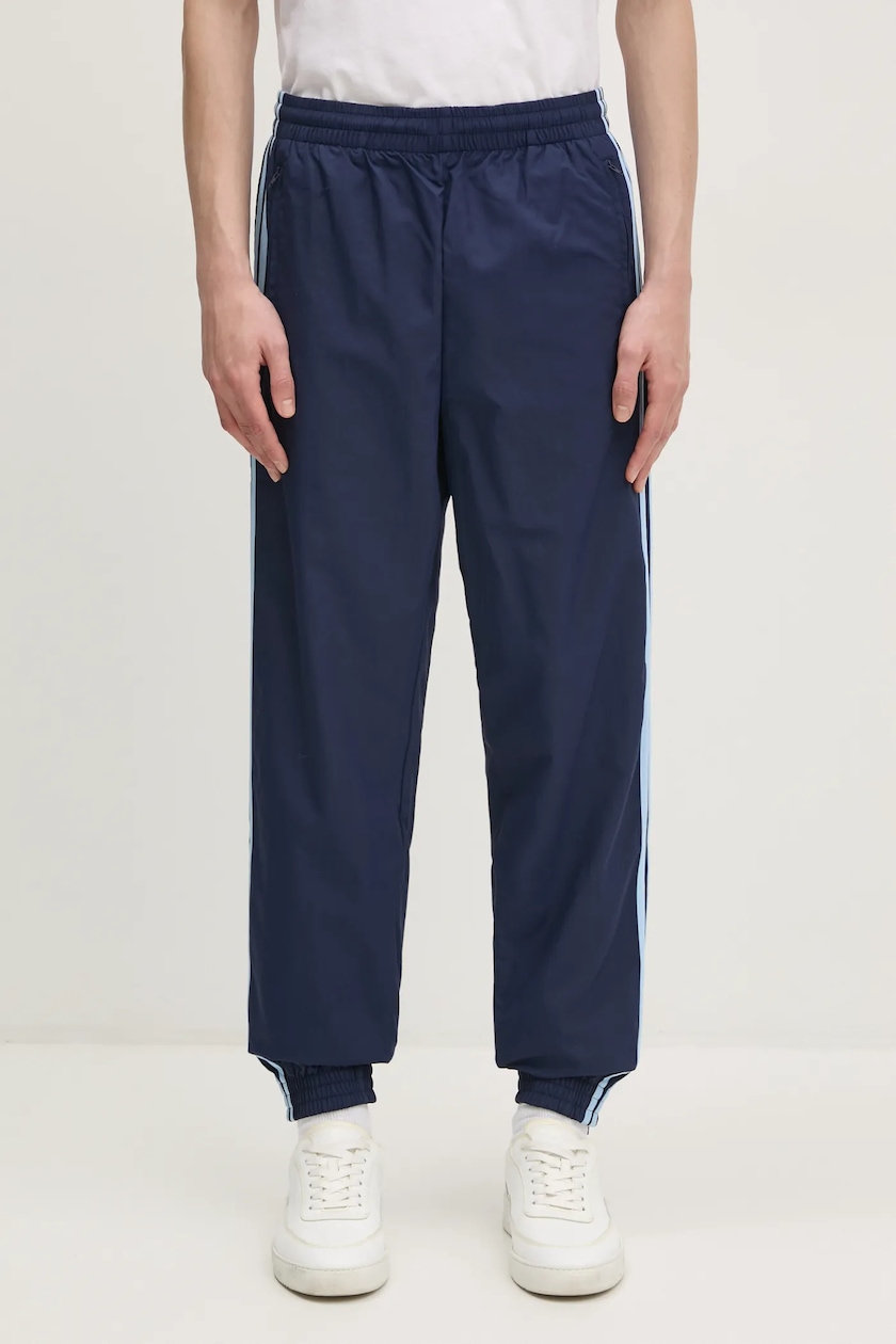 adidas Originals trousers Firebird men s navy blue color JP1249 at PRM US