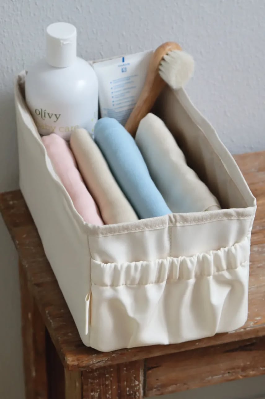 That's mine kojenecký úložný box Lucy nursing organizer