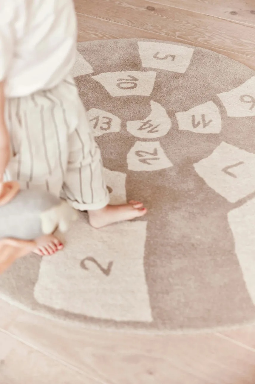 Μαλακό χαλί από μαλλί OYOY Nautilus Hopschotch 112 x 100 cm φωτογραφία