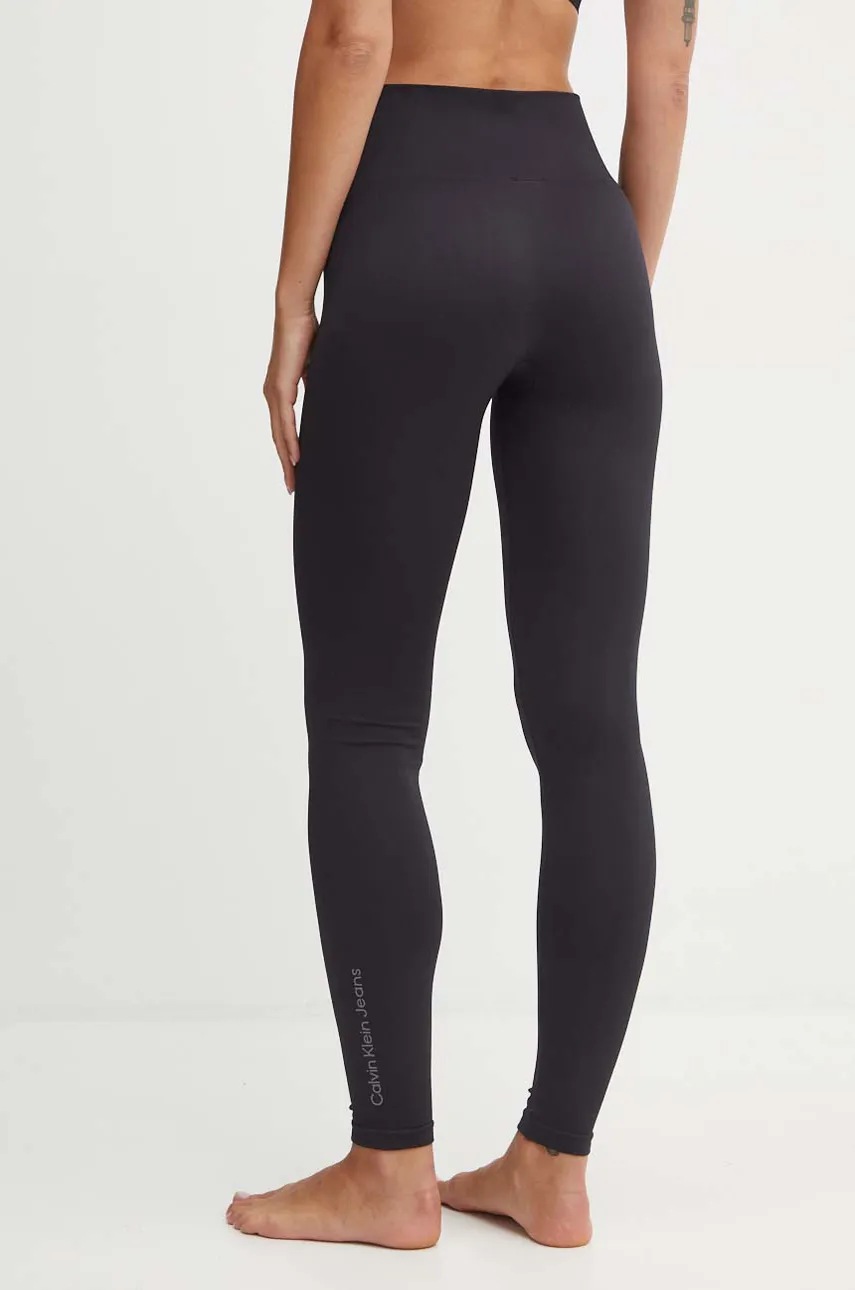 Легінси Calvin Klein Jeans жіночі колір чорний з принтом 701229798 