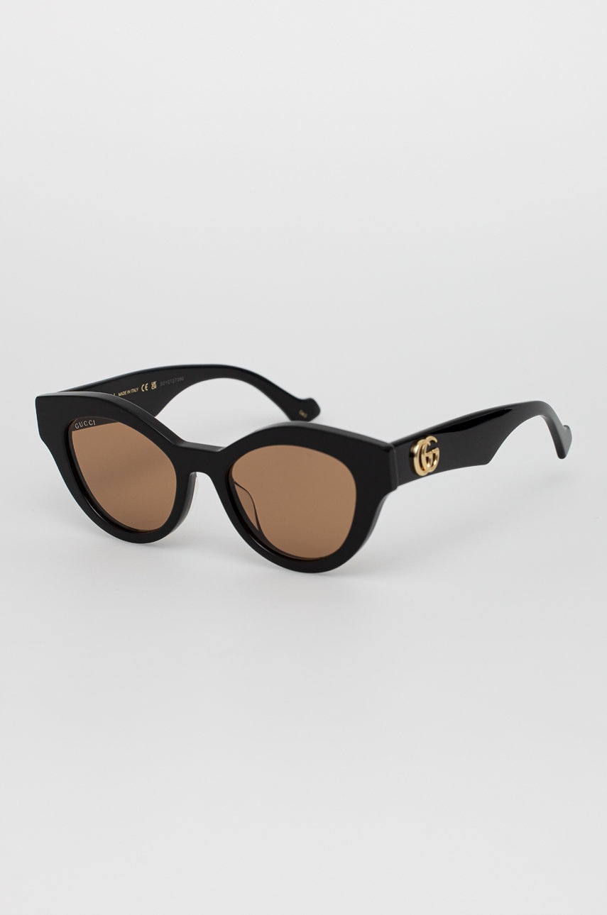 

Солнцезащитные очки Gucci женские цвет коричневый
