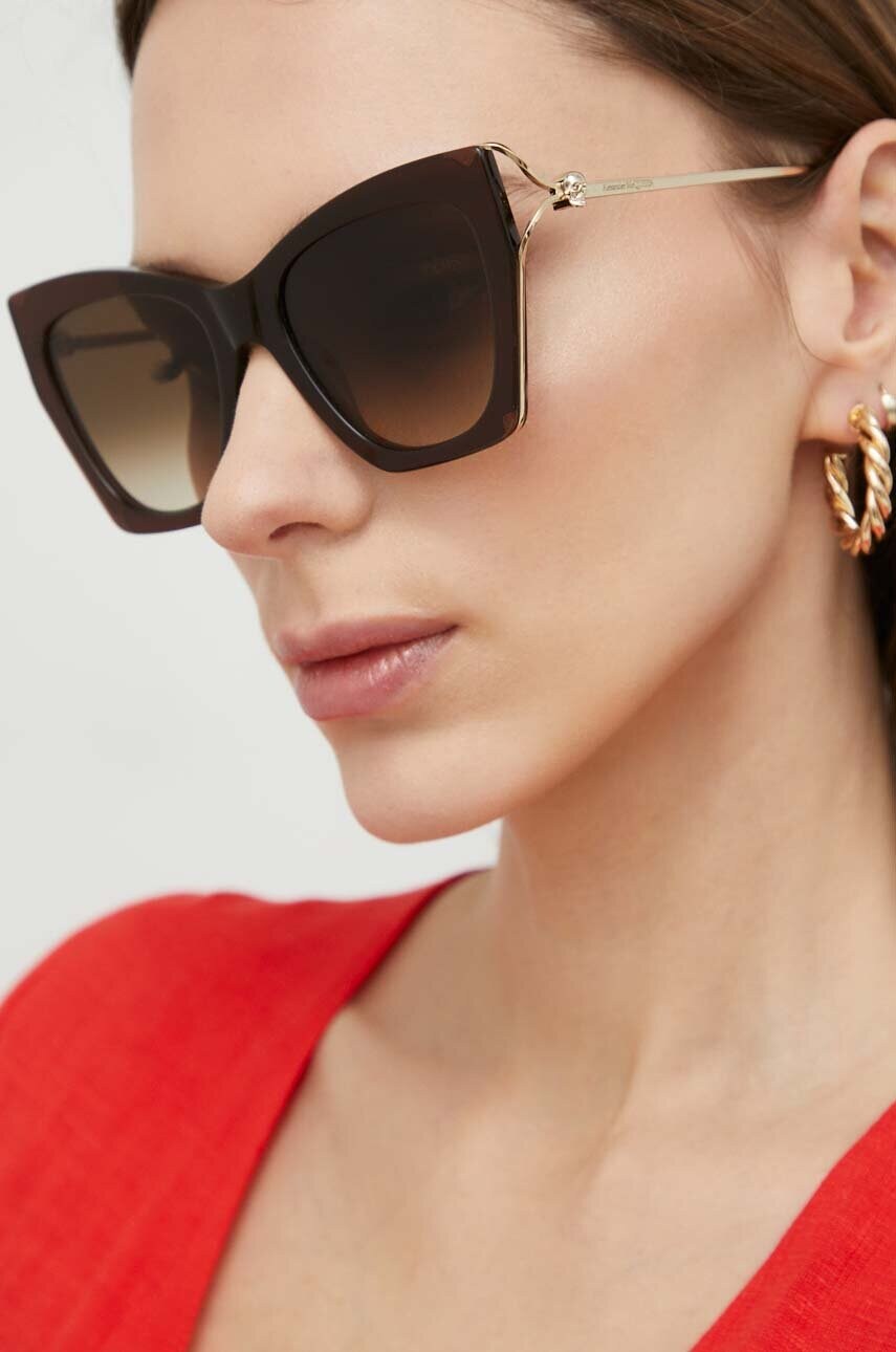 

Солнцезащитные очки Alexander McQueen женские цвет золотой