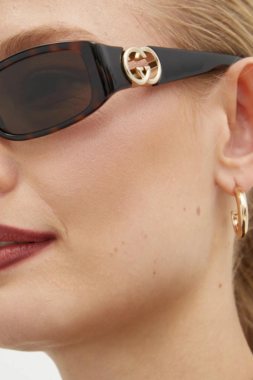 Сонцезахисні окуляри Gucci жіночі колір коричневий GG1661S 