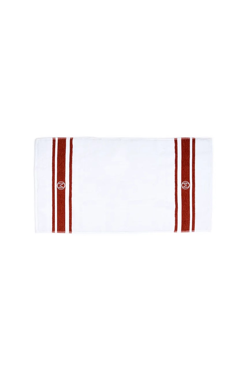 Levně Střední bavlněný ručník Officine Monogram Monogram Linea 50 x 100 cm hnědá barva