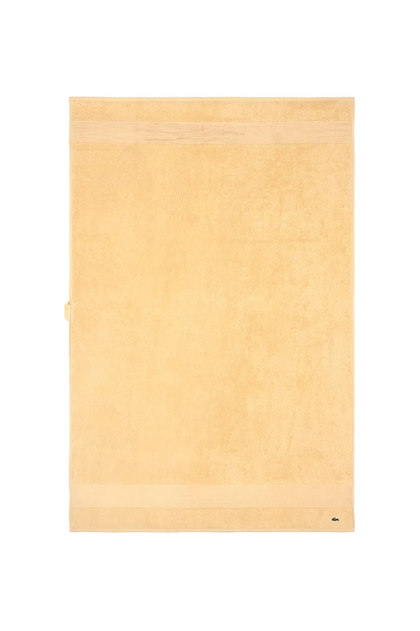 Levně Střední bavlněný ručník Lacoste L LECROCO Sesame 70 x 140 cm žlutá barva