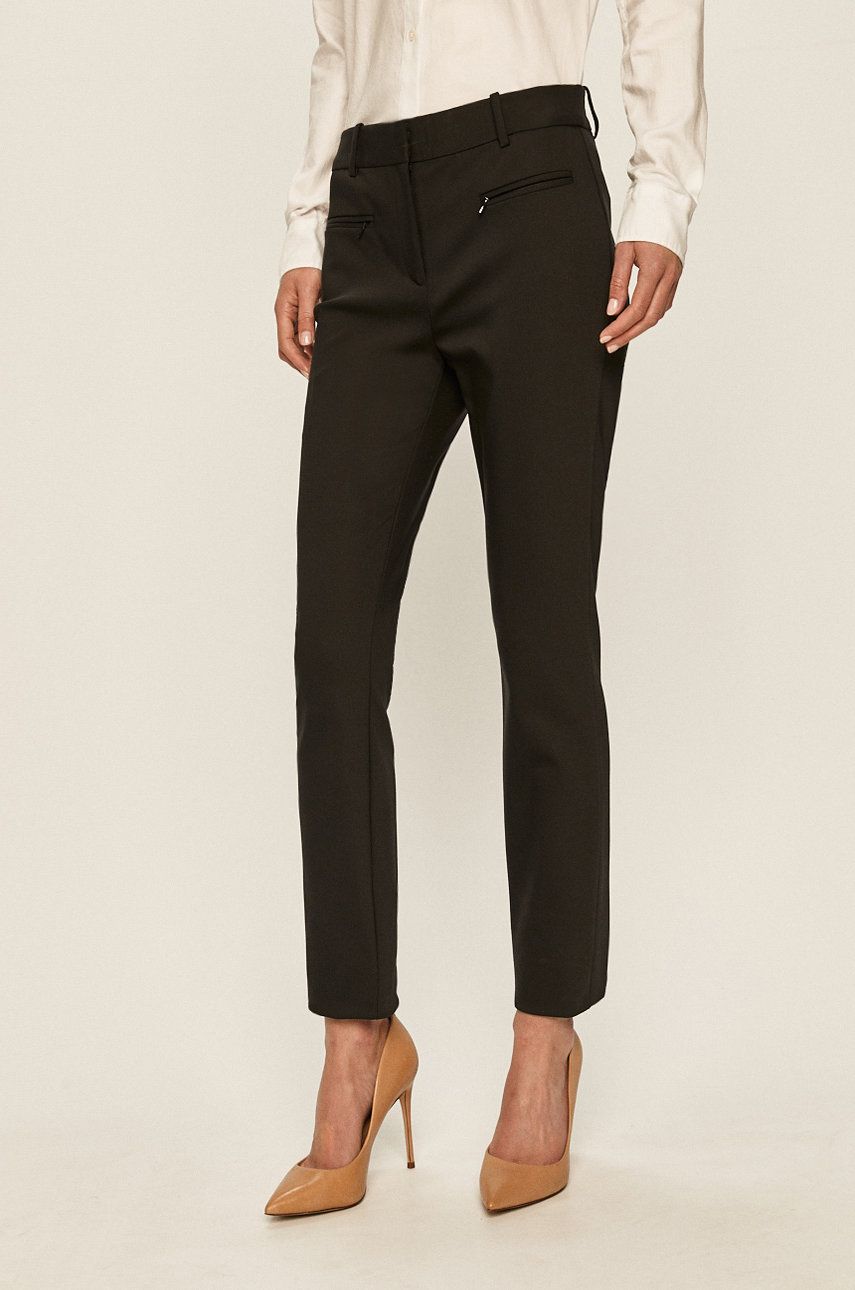 Kalhoty Tommy Hilfiger dámské, černá barva, přiléhavé, medium waist - černá -  53% Bavlna